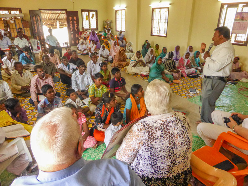 Pastor Solomon gives children talk in rural church service in India