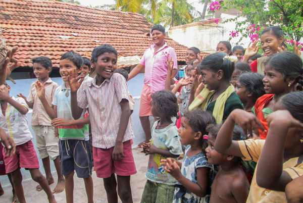 Happy tribal children singing in India
